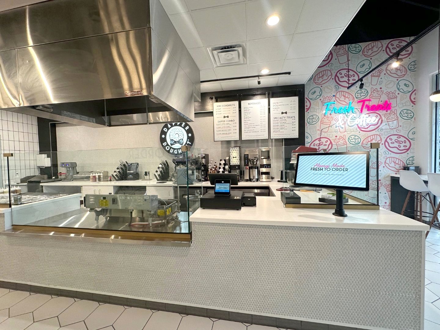 Interior of a Dapper Doughnut retail store and service counter