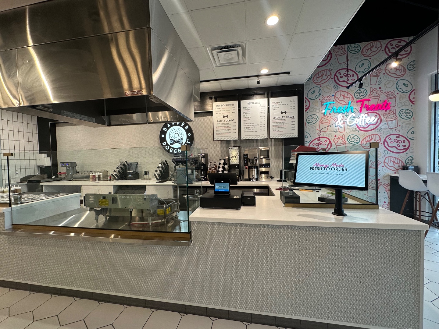 Interior of a Dapper Doughnut retail store and service counter